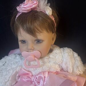 Adorable Pink and White Baby Adora  Doll with Pacifier.